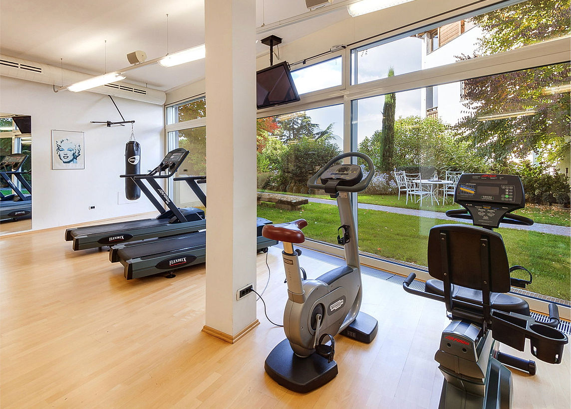 Fitness area "Well & Fit" with green view at Hotel Hohenwart